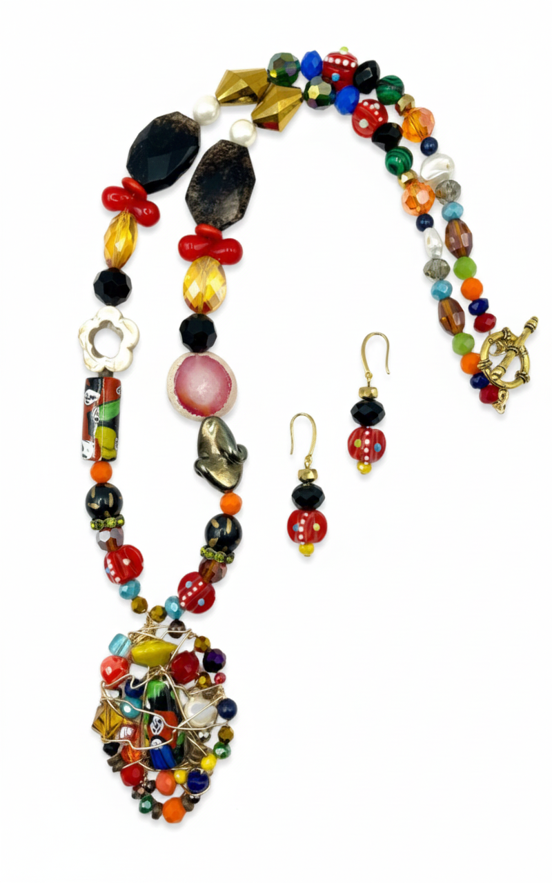Colorful beaded necklace and earrings on a white background